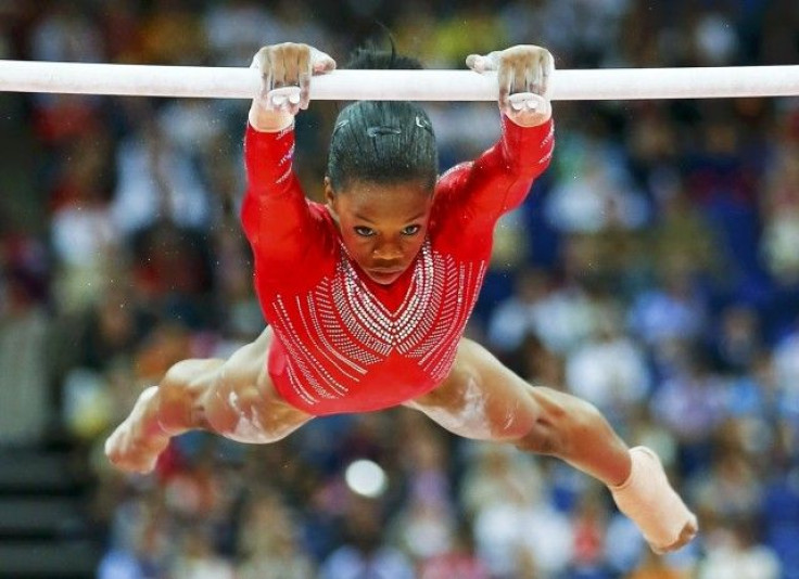Gabrielle Douglas of the U.S. performs on the asymmetric bars 