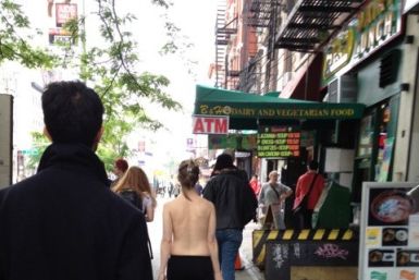 Moira Johnston walks around NYC topless