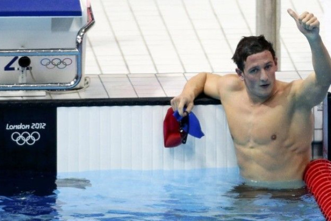 Britain&#039;s Michael Jamieson, who placed first, gives the thumbs-up after his men&#039;s 200m breaststroke semi-final during the London 2012 Olympic Games at the Aquatics Centre