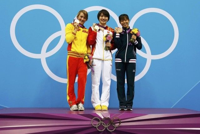 Spain's Mireia Belmonte Garcia, China's Jiao Liuyang and Japan's Natsumi Hoshi pose with their medals during the women's 200m butterfly victory ceremony at the London 2012 Olympic Games