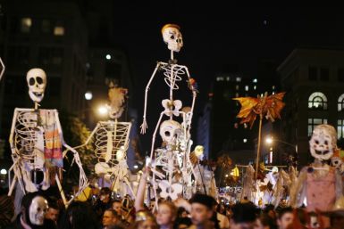 Revelers march in past Greenwich Village Halloween Parade in New York
