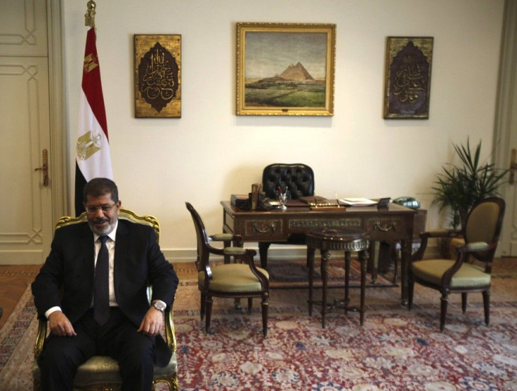 Egyptian President Mohammed Mursi seated