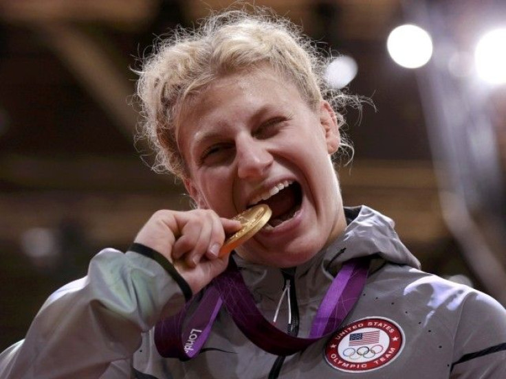 Gold medallist Kayla Harrison of the U.S. celebrates during awards ceremony for women&#039;s -78kg judo competition at London 2012 Olympic Games