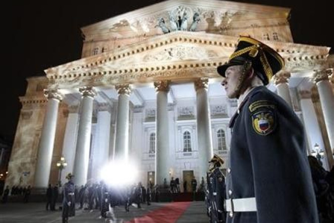 An honour guard stands in front of the Bolshoi Theater during its reopening ceremony in Moscow