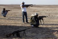 Bedouins test weapons in mountainous region of central Sinai