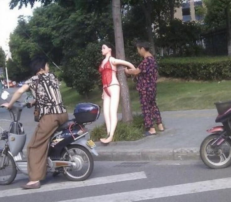 Chinese Granny Installs Sex Doll On The Street