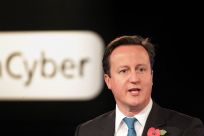 Britain&#039;s Prime Minister David Cameron speaks during London Cyberspace Conference in London