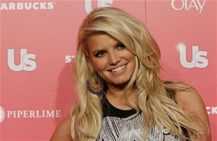 Actress and honoree Jessica Simpson poses at the US Weekly Hot Hollywood Style issue party in Hollywood