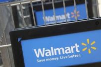 Shopping carts are seen outside a new Walmart Express store in Chicago