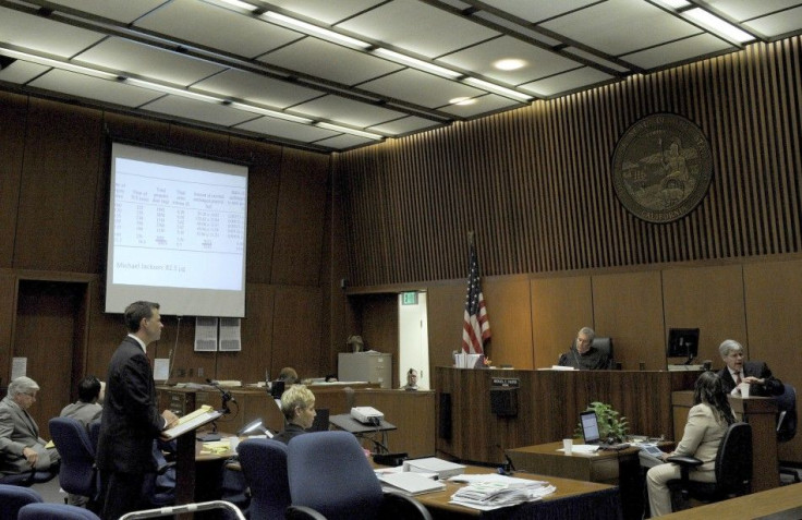 Dr. Stephen Shafer testifies as defense attorney J. Michael Flanagan listens during Dr. Conrad Murray's trial in the death of pop star Michael Jackson in Los Angeles