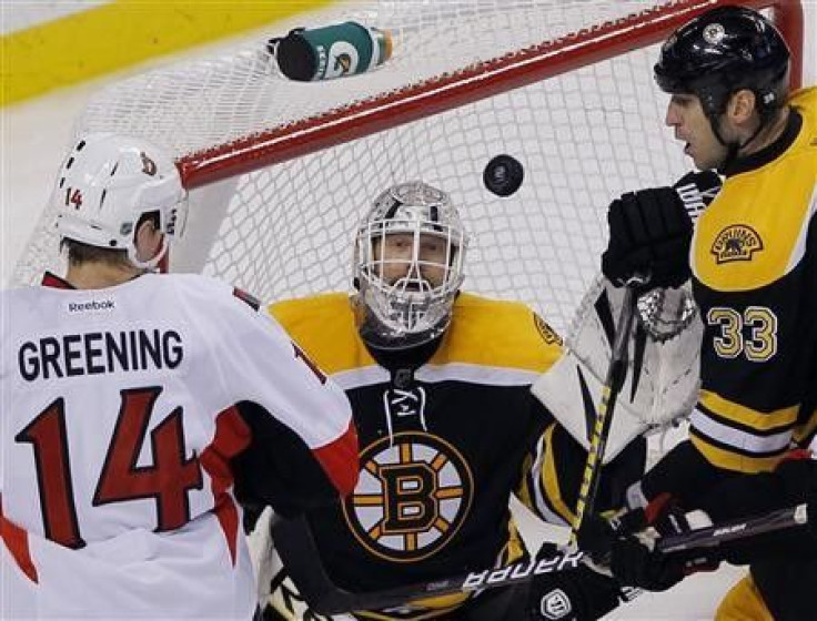 Bruins strike late to overcome streaking Senators