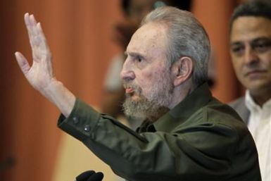 Former Cuban leader Fidel Castro gestures during the National Assembly in Havana