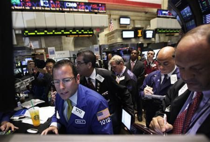 Traders work on the floor of the New York Stock Exchange