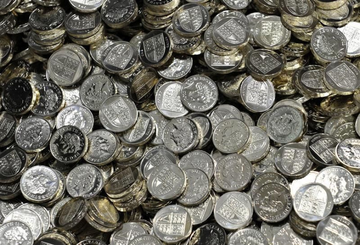 Newly minted one pound coins are seen at the Royal Mint in Cardiff