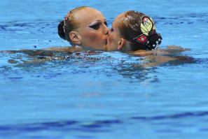 Ukrainian synchronized swimmers Daria Iushko And Kysenia Sydorenko caused quite a stir on Twitter Tuesday when the females engaged in a kiss after their finals routine at the London Olympics.