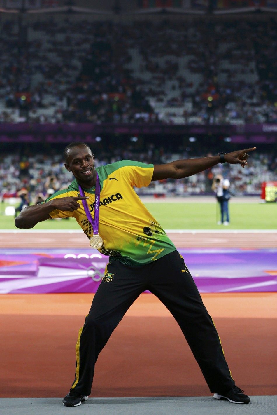 Fastest Athlete or Greatest Athlete in the World, Usain Bolt is Medias Delight Photos