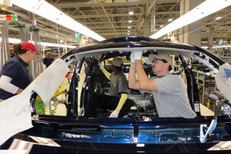 Toyota workers assemble the 2012 Corolla at the Blue Springs, Miss., plant, which began hiring 2,000 employees in 2011.