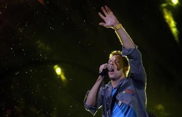 Coldplay&#039;s lead vocalist Chris Martin performs on stage during the band&#039;s world presentation of their new album &#039;&#039;Mylo Xyloto&#039;&#039; at Madrid&#039;s Las Ventas bullring