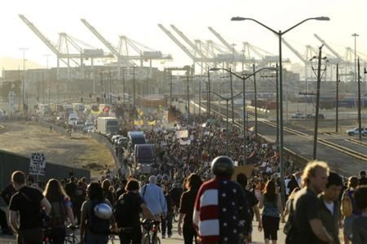 Demonstrators converge on the Port of Oakland, California, during a general strike called by the Occupy Oakland movement