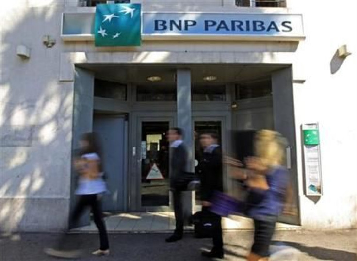 People walk in front of a branch of French BNP Paribas bank in Marseille