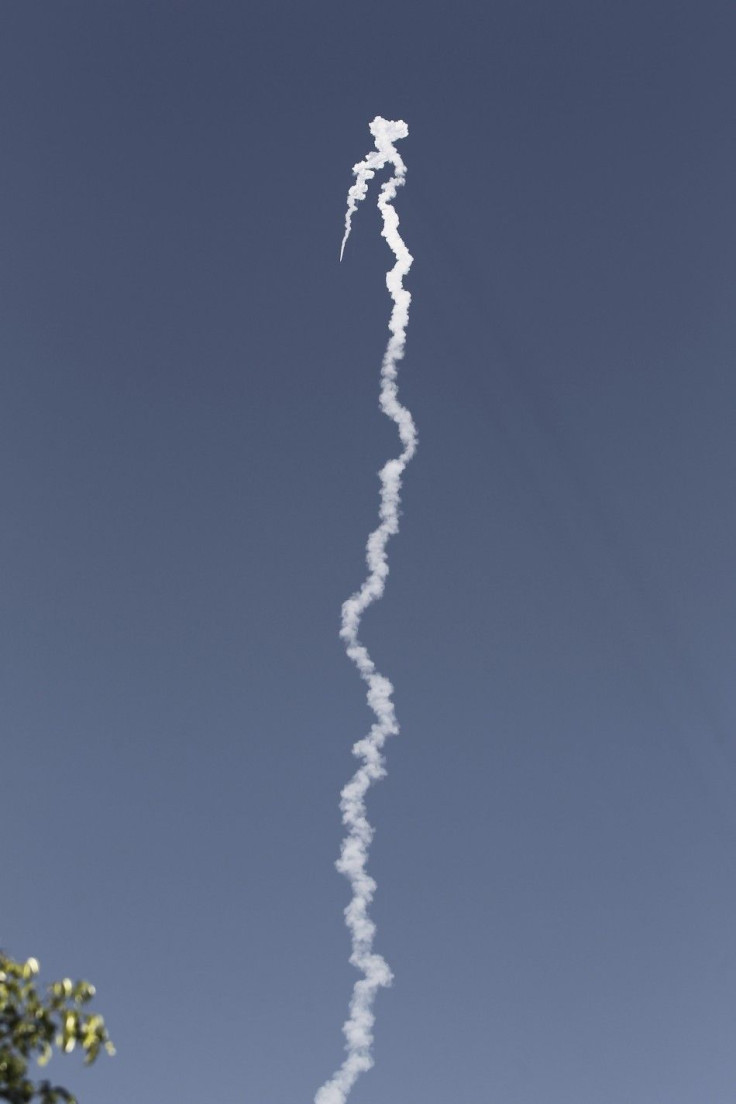 A trail of smoke from a missile is seen in the sky south of Tel Aviv November 2, 2011. Israel test-fired a missile on Wednesday, two days after Prime Minister Benjamin Netanyahu warned of the &quot;direct and heavy threat&quot; posed to the Jewish state b