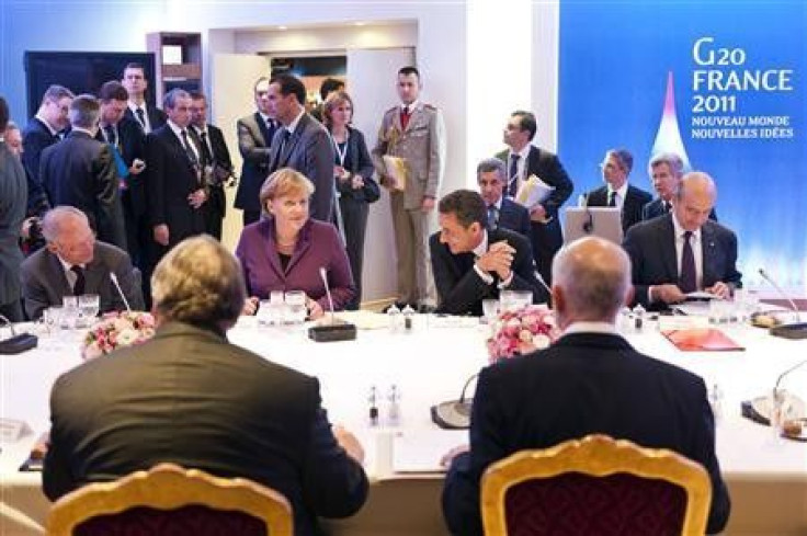 Greek PM on brink as world tells Europe to fix crisis