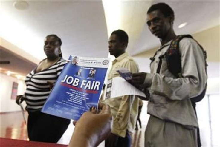 Job candidates receive information as they enter a Jobs Fair in Miami