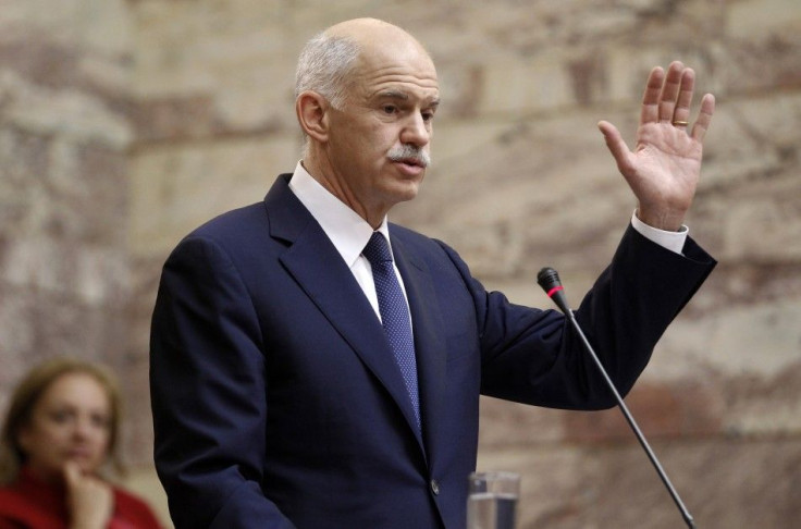 Greek Prime Minister George Papandreou delivers a speech to socialist lawmakers from his party in Athens