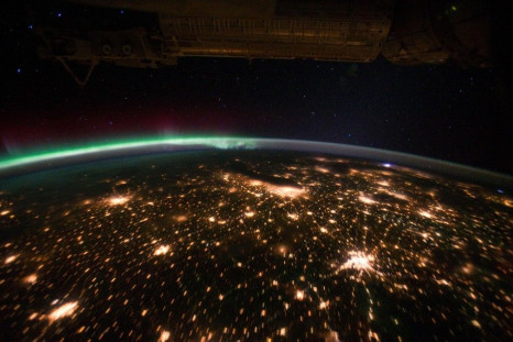 NASA handout photo shows a view of the Midwestern United States at night with Aurora Borealis, taken from the International Space Station