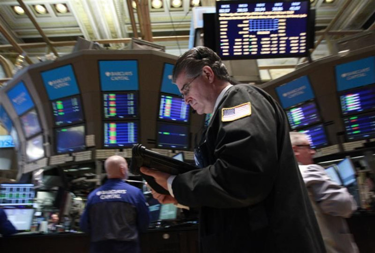 Traders work on the floor of the New York Stock Exchange