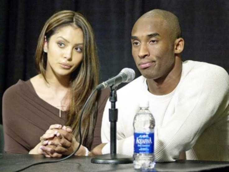 The couple sits together as Kobe Bryant admits his infidelity during a press conference