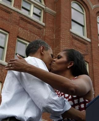 The Obamas039 First Kiss Immortalized