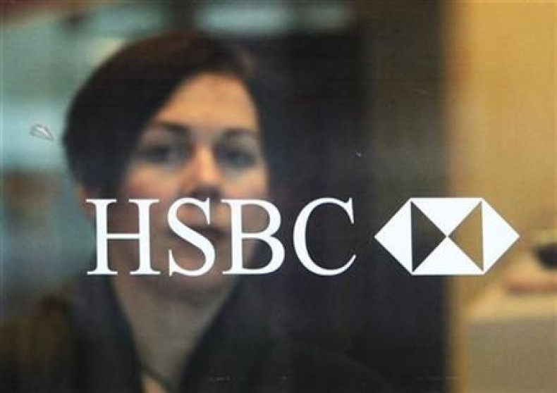 A customer exits an HSBC bank in London