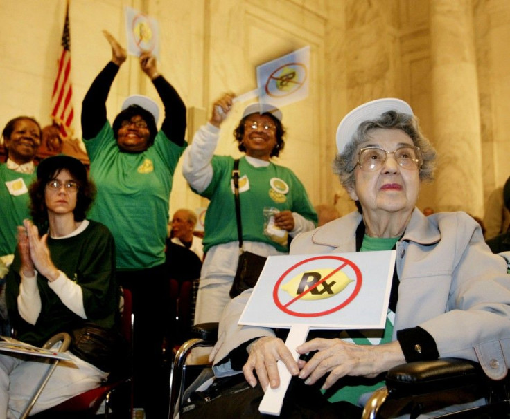 Citizens listen to congressional leaders offering support to the Alliance for Retired Americans in their opposition to a Medicare bill introduced in 2003.