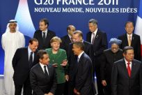 G20 leaders take part in a family photo during the G20 Summit of major world economies in Cannes