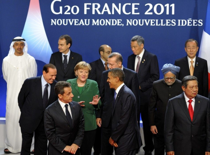 G20 leaders take part in a family photo during the G20 Summit of major world economies in Cannes