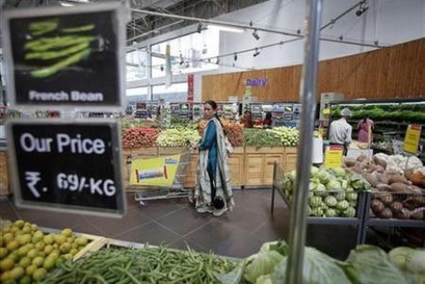 Women shop at a retail supermarket in Mumbai