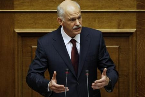 Greek Prime Minister George Papandreou addresses lawmakers in the parliament prior to a confidence vote in Athens
