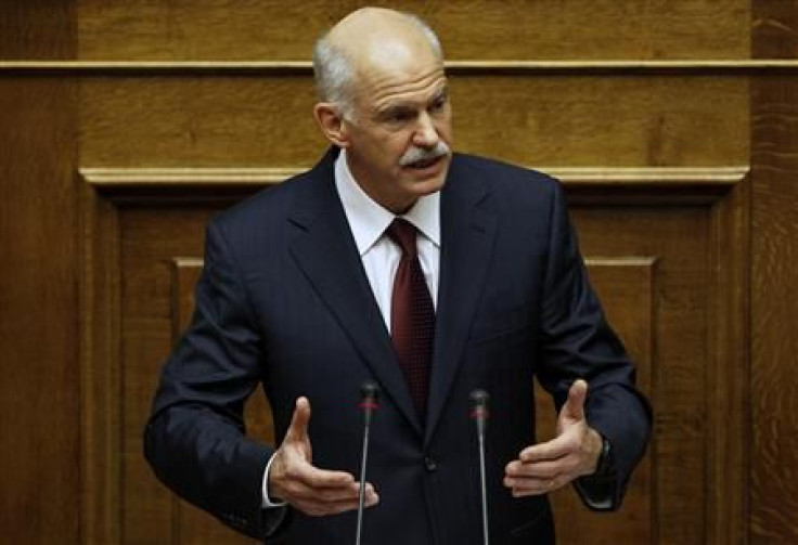 Greek Prime Minister George Papandreou addresses lawmakers in the parliament prior to a confidence vote in Athens