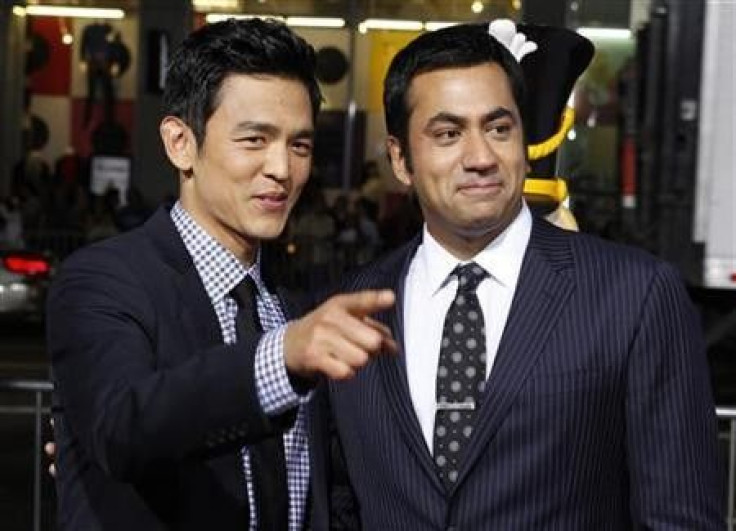 Actors John Cho (L) and Kal Penn pose at the premiere of their new film &#039;&#039;A Very Harold & Kumar 3D Christmas&#039;&#039; in Hollywood