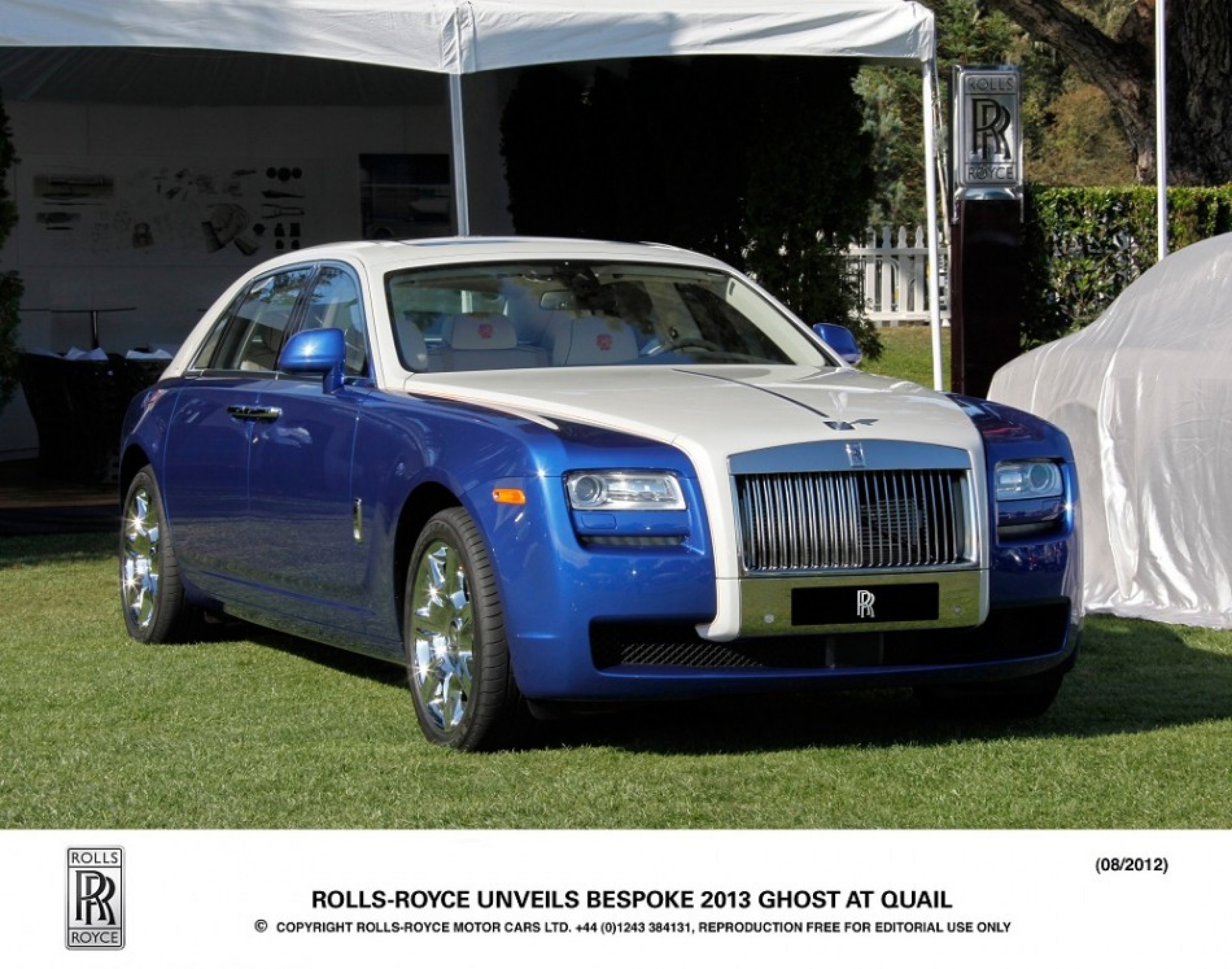 The new 2013 Rolls-Royce Ghost parked at Pebble Beach.