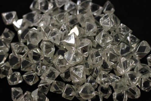 Uncut diamonds from southern Africa and Canada are seen at De Beers headquarters in London