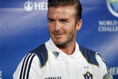 LA Galaxy's David Beckham attends a news conference to announce the Herbalife World Football Challenge 2011 soccer tournament in Los Angeles