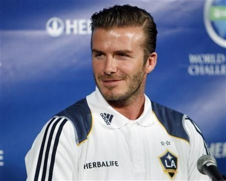 LA Galaxy's David Beckham attends a news conference to announce the Herbalife World Football Challenge 2011 soccer tournament in Los Angeles