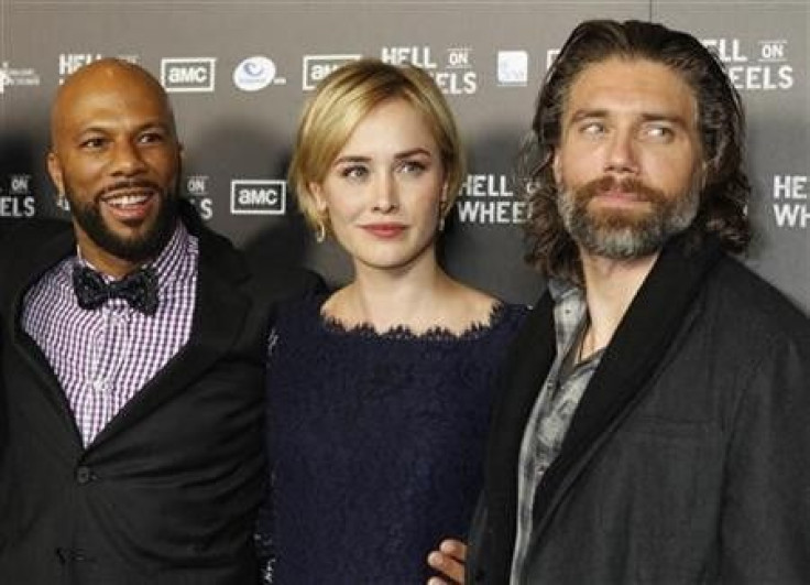 Cast members (L-R) Common, Dominique McElligott and Anson Mount pose at the premiere screening of AMC cable channel&#039;s new series &#039;&#039;Hell on Wheels&#039;&#039; in Los Angeles, California