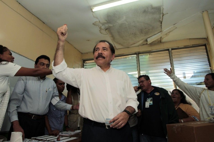 Daniel Ortega, Nicaragua's current president and presidential candidate from the ruling Sandinista National Liberation Front, shows ink-stained finger after casting his vote during presidential elections at a polling station in Managua