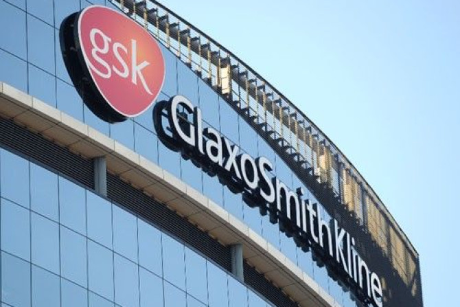 A GlaxoSmithKline logo is seen outside one of its buildings in west London