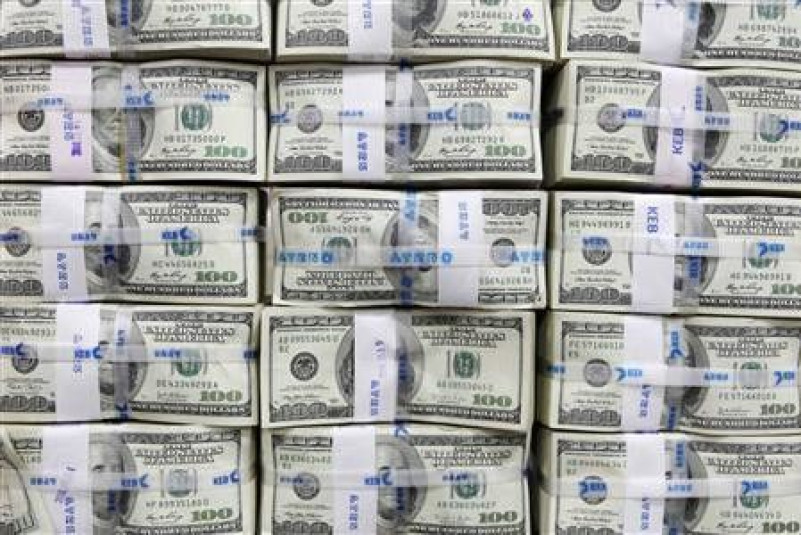 U.S. dollar notes are seen in this picture illustration