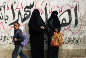 Palestinian women watch funeral of Islamic Jihad militant Mohammed Daher in Gaza City 