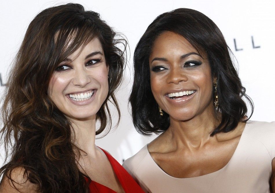  Actors Berenice Marlohe and Naomie Harris pose while launching the start of production of the new James Bond film quotSkyFallquot at a restaurant in London